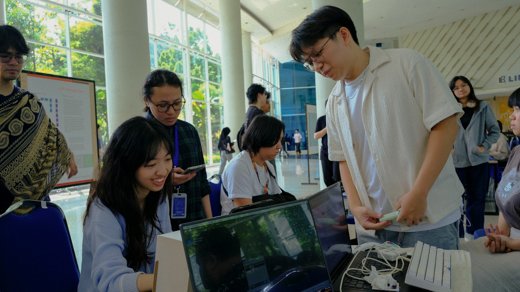 Students presenting at a science event